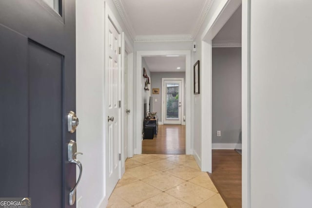 1280 Sherry Dr, Alpharetta, GA 30009 - foyer entrance with crown molding, light tile patterned floors, and baseboards