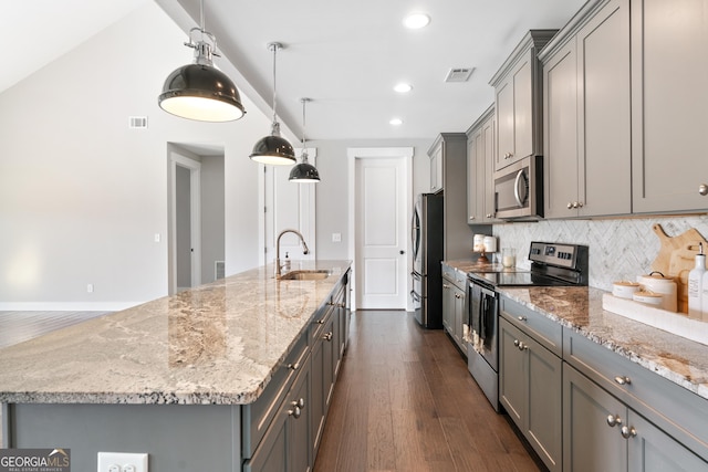 133 Wild Turkey Pass, Homer, GA 30547 - kitchen with stainless steel appliances, gray cabinetry, a sink, dark wood finished floors, and a large island with sink