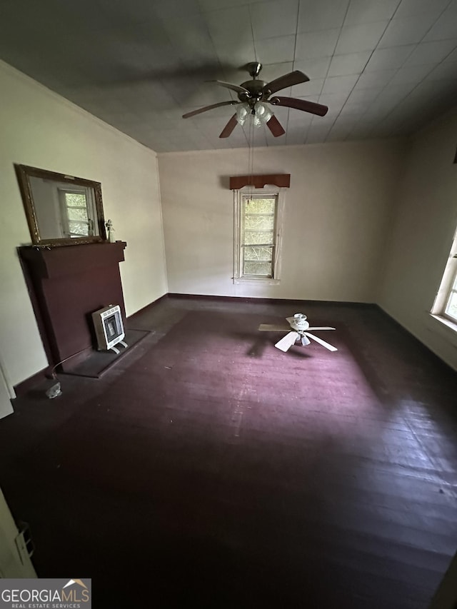 35 Hancock St, Warm Springs, GA 31830 - unfurnished living room featuring ceiling fan and baseboards