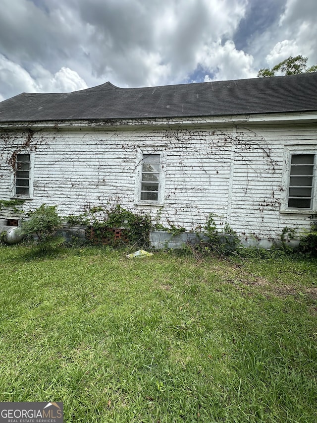35 Hancock St, Warm Springs, GA 31830 - view of side of home with a yard