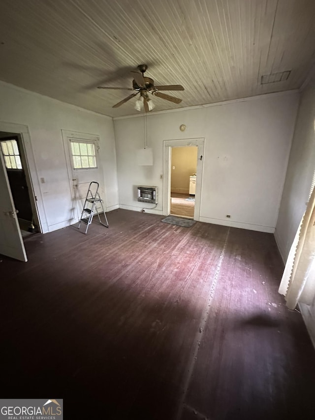 35 Hancock St, Warm Springs, GA 31830 - unfurnished living room with heating unit, dark wood-type flooring, ceiling fan, and wooden ceiling