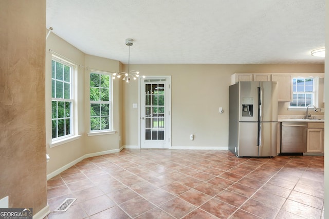 259 Pine Valley Dr, Powder Springs, GA 30127 - unfurnished dining area with light tile patterned flooring and a chandelier