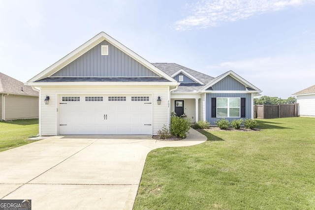 view of front of property featuring board and batten siding, driveway, and an attached garage