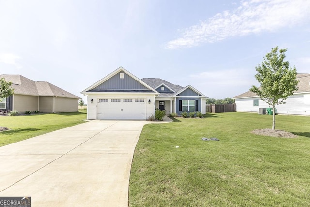 craftsman house featuring board and batten siding, driveway, an attached garage, and central AC unit