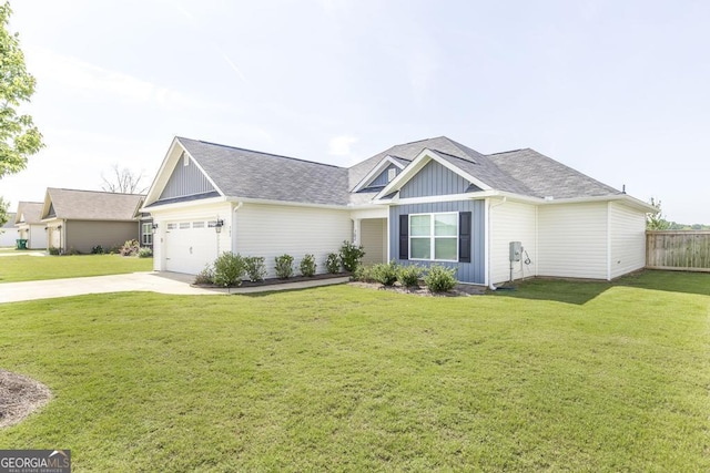view of front of house featuring board and batten siding, driveway, an attached garage, and a shingled roof