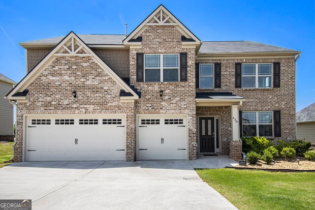 320 Conley Ave, Hampton, GA 30228 - view of front of home with brick siding, concrete driveway, roof with shingles, and an attached garage