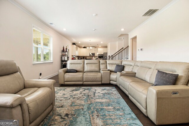 320 Conley Ave, Hampton, GA 30228 - living area with crown molding, recessed lighting, and stairway