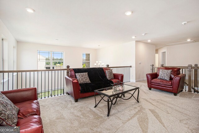 320 Conley Ave, Hampton, GA 30228 - carpeted living room with a chandelier and recessed lighting