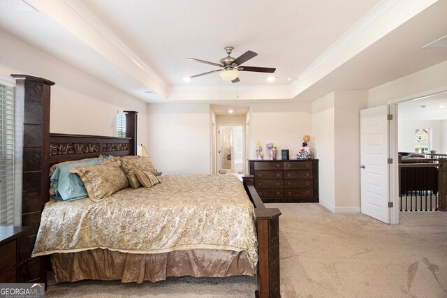 320 Conley Ave, Hampton, GA 30228 - carpeted bedroom with a raised ceiling, recessed lighting, a ceiling fan, ensuite bathroom, and crown molding