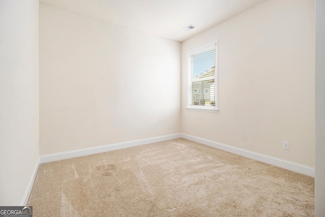 320 Conley Ave, Hampton, GA 30228 - carpeted spare room with baseboards