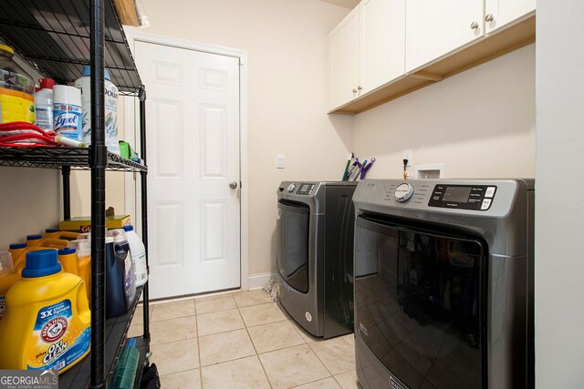 320 Conley Ave, Hampton, GA 30228 - laundry area with cabinet space, independent washer and dryer, and light tile patterned floors