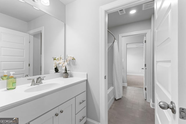 10 Georgian Oaks Ct, Newnan, GA 30265 - full bathroom with vanity, shower / tub combo with curtain, baseboards, and tile patterned floors