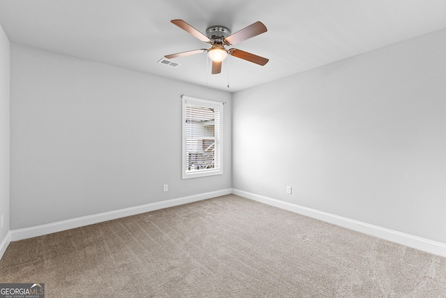 10 Georgian Oaks Ct, Newnan, GA 30265 - carpeted spare room with baseboards and ceiling fan