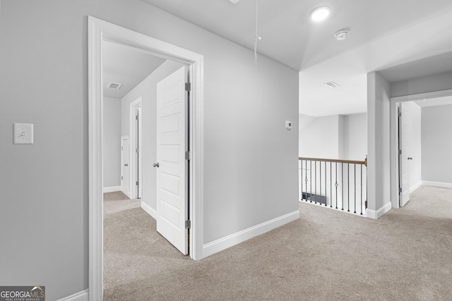 10 Georgian Oaks Ct, Newnan, GA 30265 - hall with attic access, carpet, and baseboards