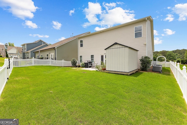 10 Georgian Oaks Ct, Newnan, GA 30265 - back of house with a storage shed, an outbuilding, a patio, and central AC unit