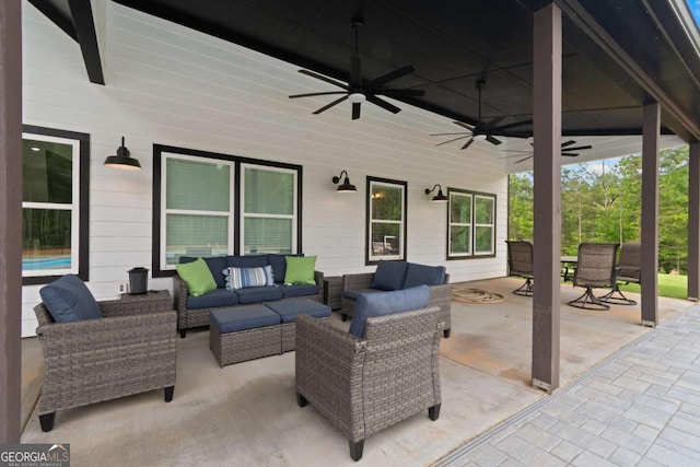 view of patio featuring outdoor lounge area and a ceiling fan