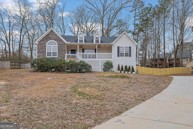 954 Josie Ct, Lawrenceville, GA 30045 - view of front facade with a porch and stone siding