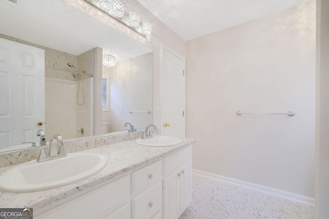 954 Josie Ct, Lawrenceville, GA 30045 - bathroom featuring a shower and double vanity