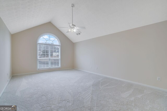954 Josie Ct, Lawrenceville, GA 30045 - unfurnished room with a ceiling fan, light carpet, and vaulted ceiling