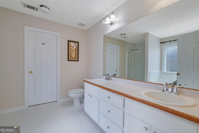954 Josie Ct, Lawrenceville, GA 30045 - bathroom featuring a shower stall, double vanity, and tile patterned flooring