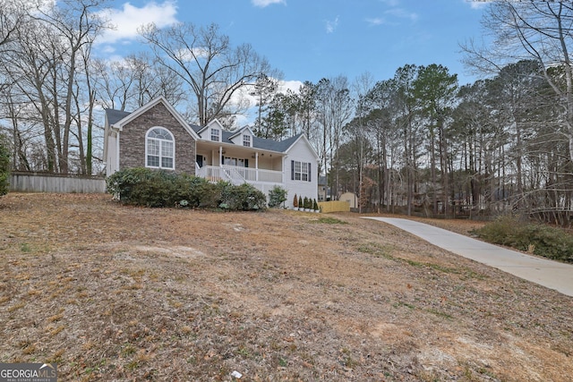 954 Josie Ct, Lawrenceville, GA 30045 - view of front of house with covered porch and stone siding