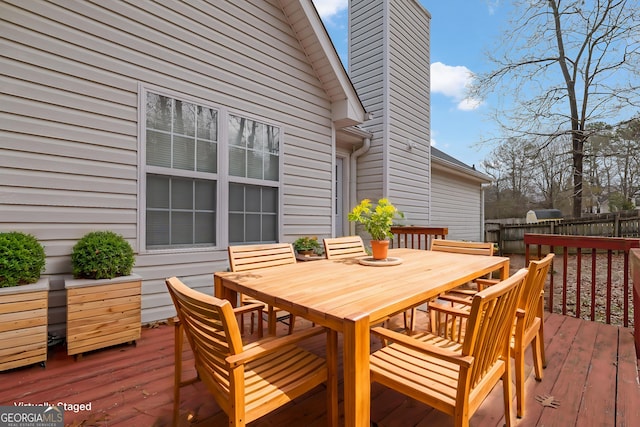 954 Josie Ct, Lawrenceville, GA 30045 - wooden deck with outdoor dining area