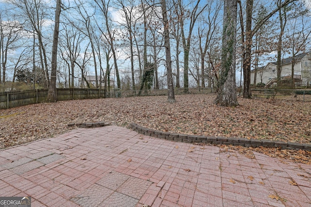 954 Josie Ct, Lawrenceville, GA 30045 - fenced backyard featuring a patio