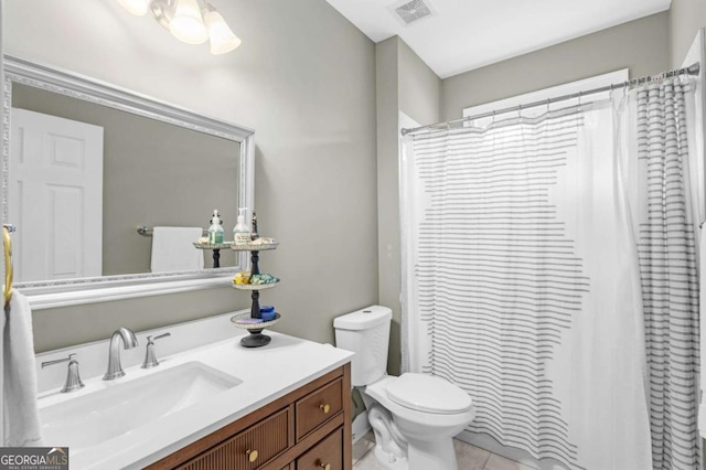 4840 Spring Park Cir, Suwanee, GA 30024 - bathroom featuring toilet, vanity, curtained shower, and tile patterned flooring