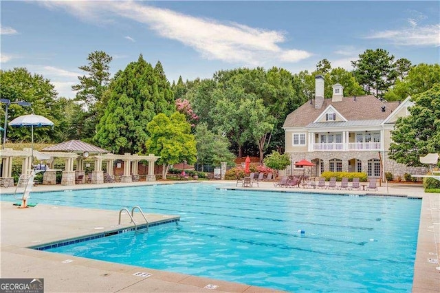 4840 Spring Park Cir, Suwanee, GA 30024 - community pool featuring a patio