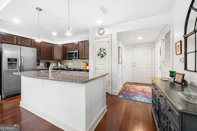200 River Vista Dr Unit 120, Atlanta, GA 30339 - kitchen featuring appliances with stainless steel finishes, dark wood-type flooring, dark brown cabinetry, backsplash, and recessed lighting