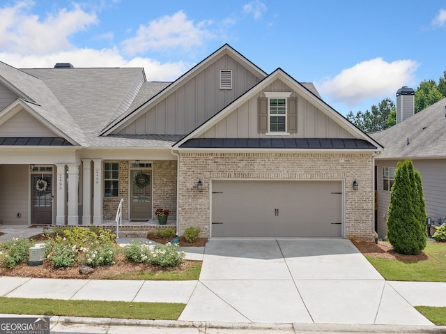 2499 Barrett Preserve Ct SW, Marietta, GA 30064 - craftsman inspired home featuring brick siding, board and batten siding, and concrete driveway