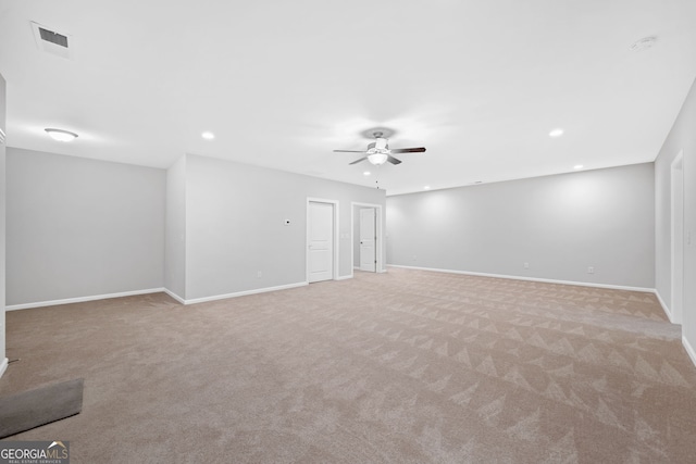 2499 Barrett Preserve Ct SW, Marietta, GA 30064 - unfurnished living room featuring light carpet, a ceiling fan, baseboards, and recessed lighting
