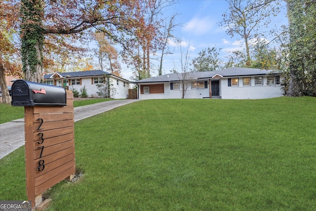 2378 Green Forrest Dr, Decatur, GA 30032 - ranch-style home with concrete driveway and a front lawn