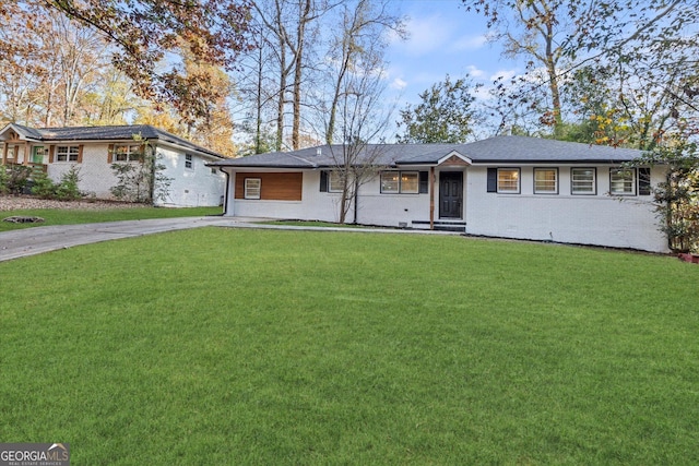 2378 Green Forrest Dr, Decatur, GA 30032 - ranch-style house with a front yard, brick siding, and driveway