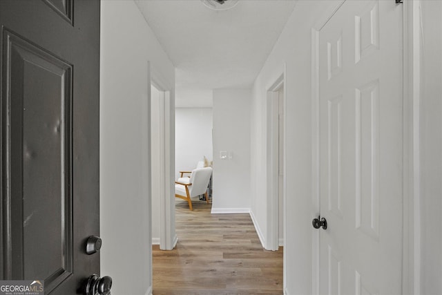2378 Green Forrest Dr, Decatur, GA 30032 - hall with light wood-style flooring and baseboards