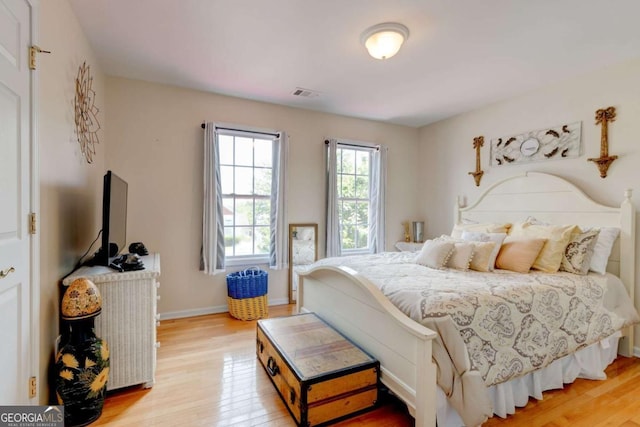 2707 Mariner Way, Villa Rica, GA 30180 - bedroom featuring light wood-style flooring and baseboards