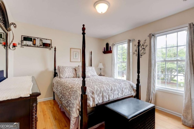2707 Mariner Way, Villa Rica, GA 30180 - bedroom with light wood-style floors and baseboards