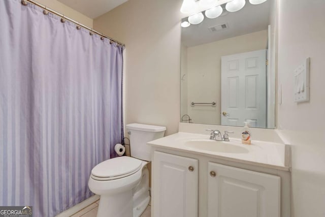 2707 Mariner Way, Villa Rica, GA 30180 - bathroom featuring toilet, vanity, tile patterned flooring, and curtained shower