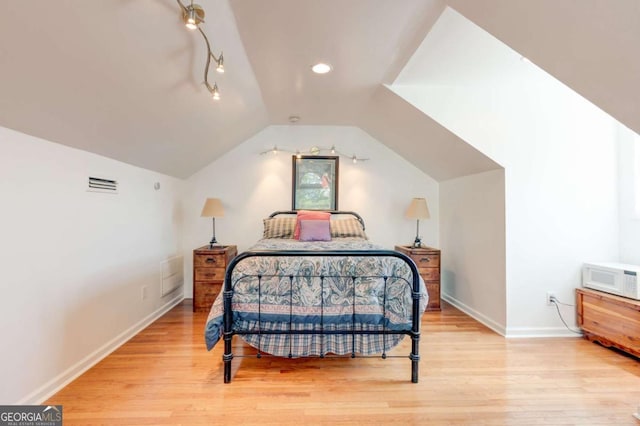 2707 Mariner Way, Villa Rica, GA 30180 - bedroom featuring light wood-style floors, baseboards, and vaulted ceiling