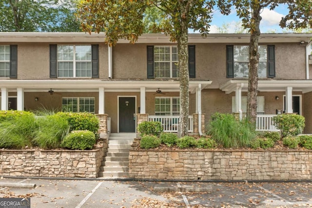 3200 Seven Pines Ct Unit 103, Atlanta, GA 30339 - view of front of home featuring a porch and stucco siding