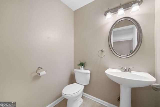 3200 Seven Pines Ct Unit 103, Atlanta, GA 30339 - half bathroom with toilet, tile patterned floors, and baseboards