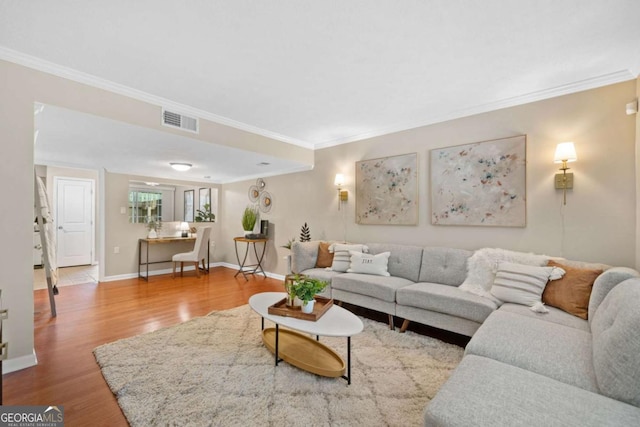 3200 Seven Pines Ct Unit 103, Atlanta, GA 30339 - living room featuring wood finished floors, ornamental molding, and baseboards