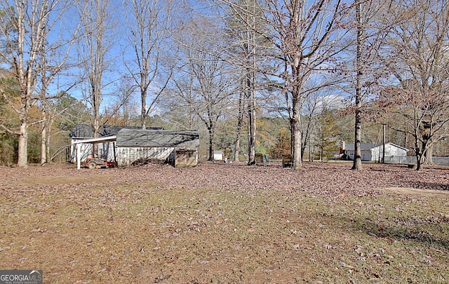 view of yard with a carport