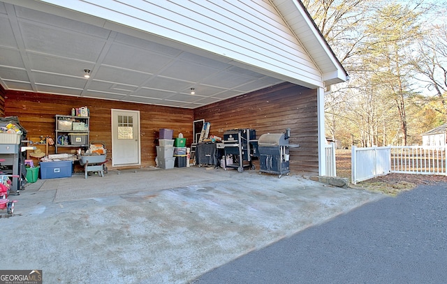 garage with fence