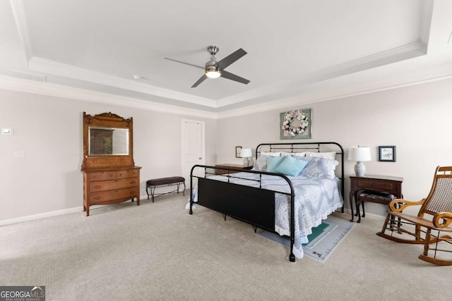 6658 Rivergreen Rd, Flowery Branch, GA 30542 - bedroom with a tray ceiling, ornamental molding, light colored carpet, and ceiling fan