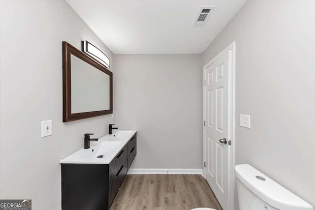 2317 Baywood Dr SE, Atlanta, GA 30315 - bathroom with wood finished floors and double vanity