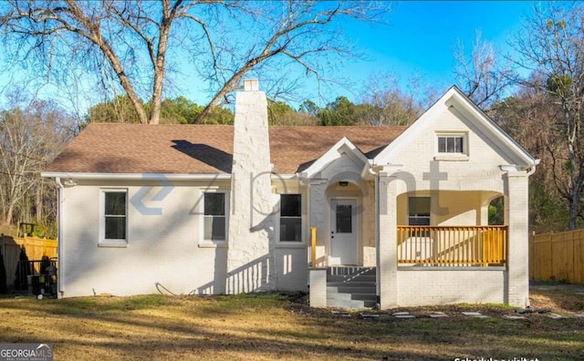 5510 Mason Rd, South Fulton, GA 30349 - view of front of property featuring brick siding, a chimney, a porch, and a shingled roof