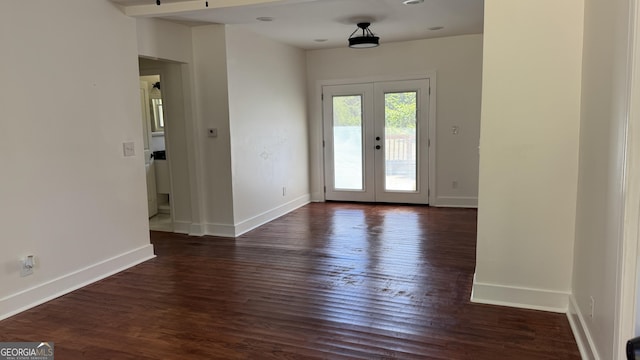 5510 Mason Rd, South Fulton, GA 30349 - foyer entrance featuring french doors, dark wood-style floors, and baseboards