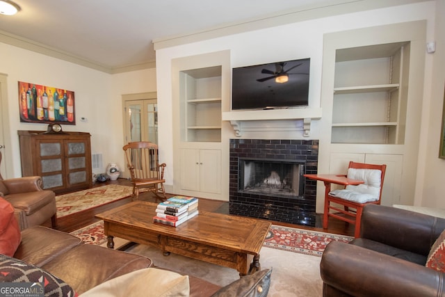 20 Salbide Ave, Newnan, GA 30263 - living area with built in shelves, a fireplace, wood finished floors, and french doors