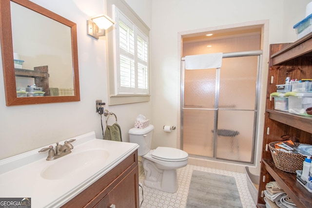 20 Salbide Ave, Newnan, GA 30263 - full bathroom featuring a shower stall, vanity, toilet, and tile patterned flooring